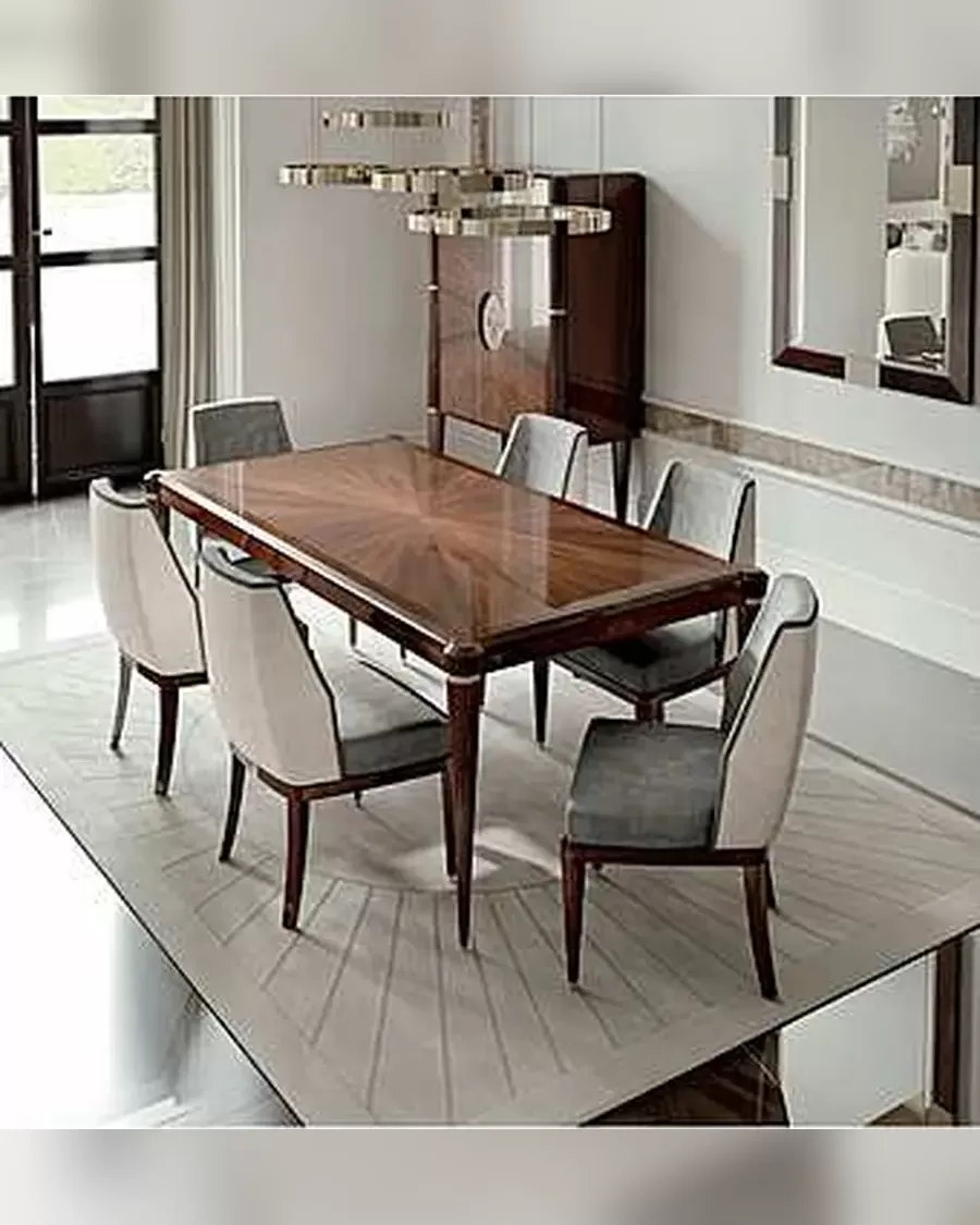 Ellipse Round Dining Table by Francesco Pasi, table in front of a dining room buffet