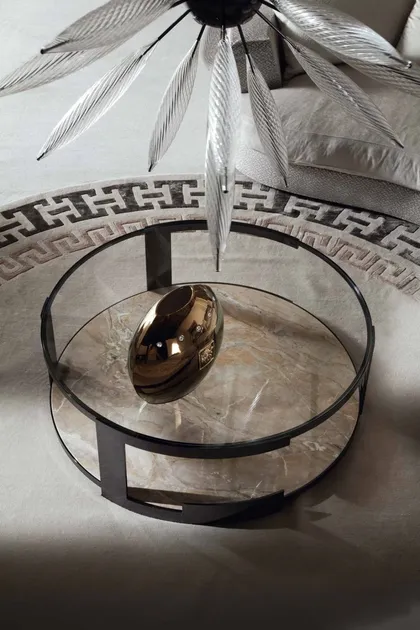 Modern oval coffee table showcasing metallic details and a smooth surface for refined interior styling, oval coffee table