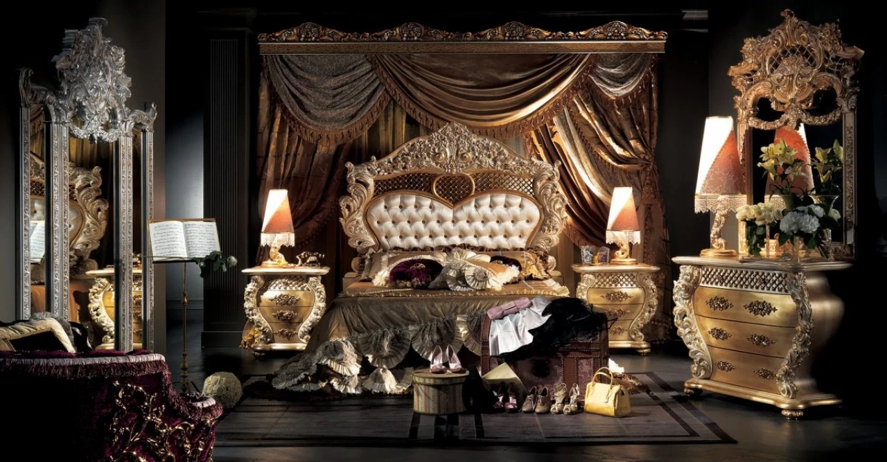 Classic bedroom with a gilded bed, nightstands and a canopy drape, Italian made furniture